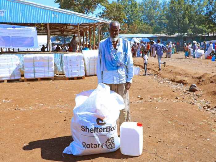 Man with a bag of aid in Ethiopia