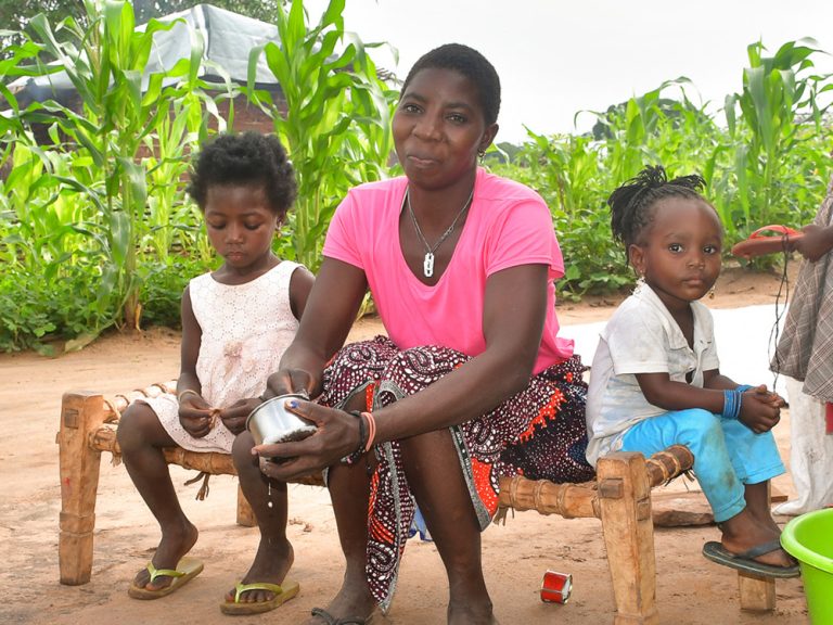 Lady sitting with family